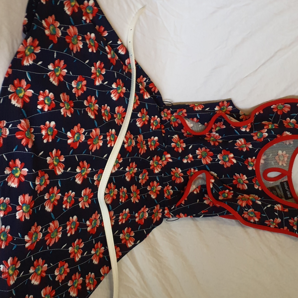 Red and black floral dress with leatherette white belt